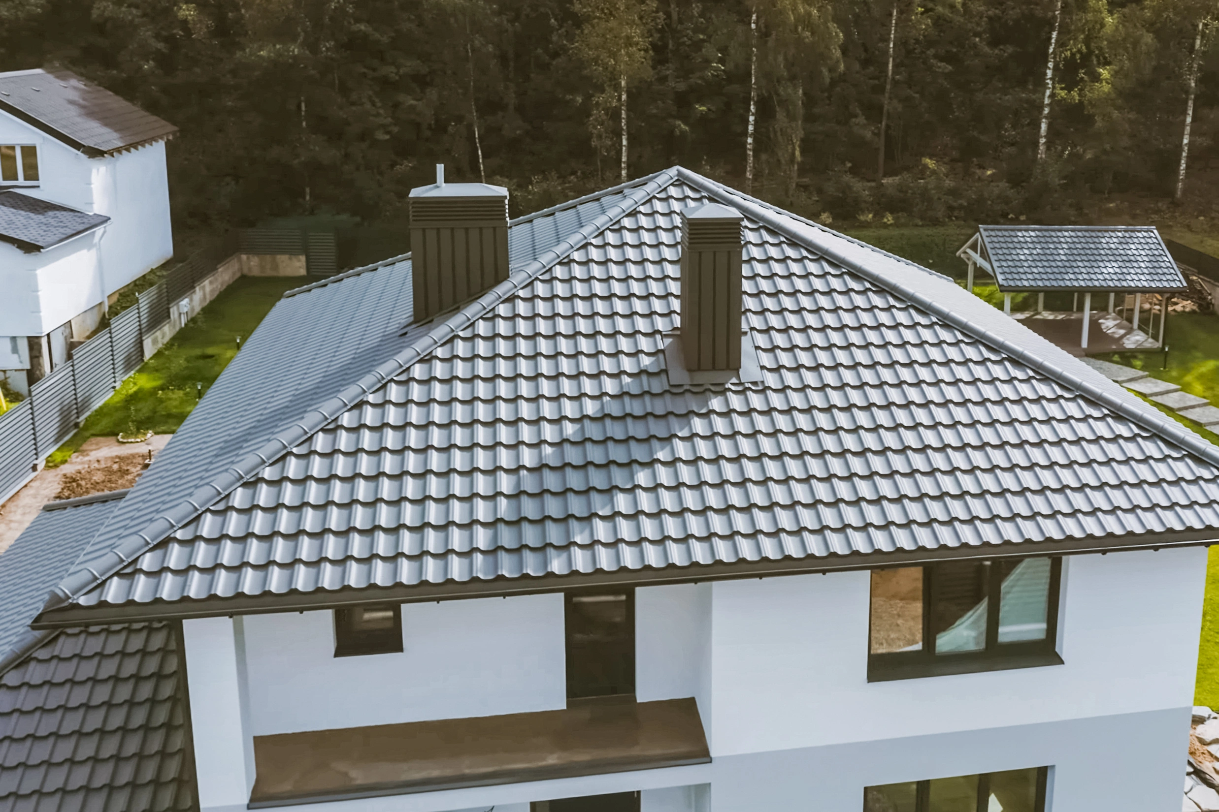 gray metal tile roof: Tampa roofing company